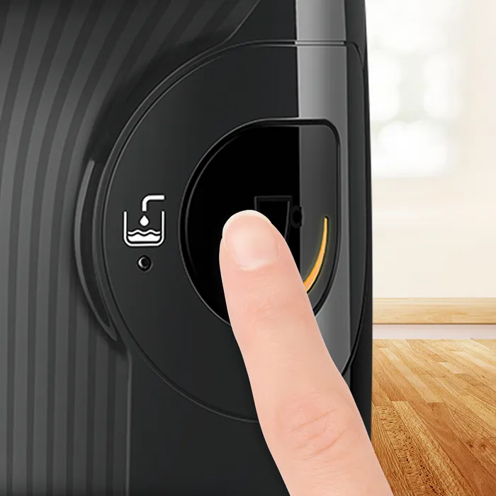 Απεικονίζεται η πίεση του κουμπιού για την παρασκευή του καφέ.